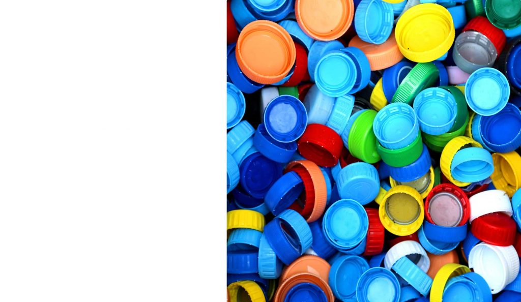 Sticking wads in plastic bottle caps - Mahisa Packaging Systems LLP